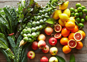 a group of fruits and vegetables on a wood surface Healthy Weight Loss Diets Central Milton Keynes